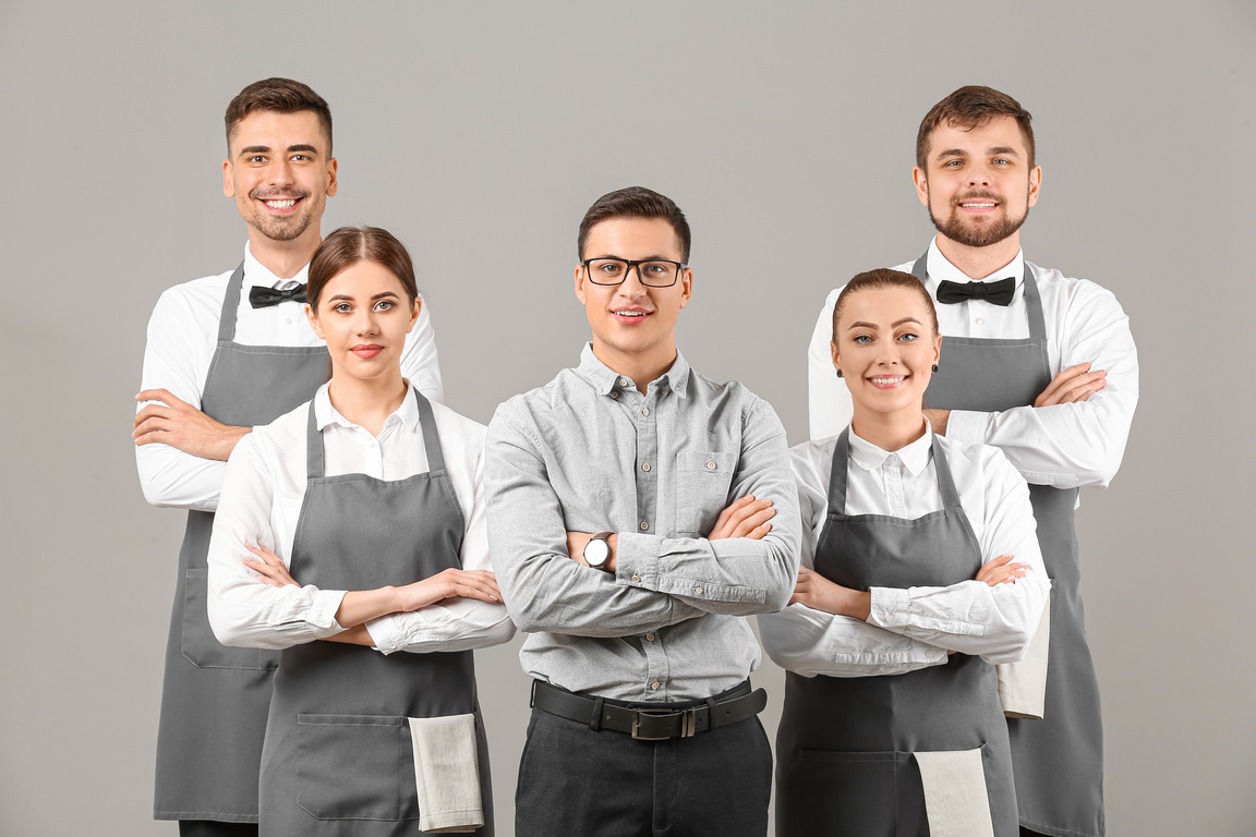 Group of Waiters with Manager